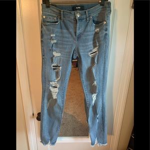 Destroyed light jeans